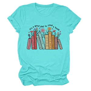Detail of teal cotton t-shirt with book and flower print featuring inspirational text
