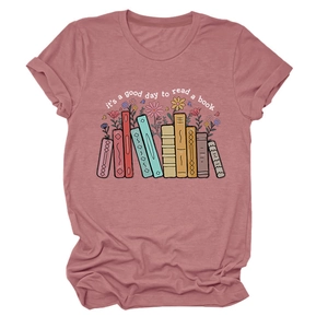 Detail of pink cotton T-shirt featuring colorful floral and book graphic print