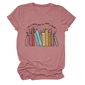 Detail of soft cotton knit fabric with colorful book and floral graphic print