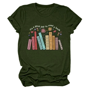 Detail of green T-shirt featuring it's a good day to read book and floral book print