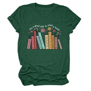 Detail of green t-shirt with books and flowers print it's a good day to read a book