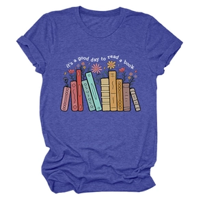 Detail of a blue t-shirt featuring a colorful book collection and floral print design