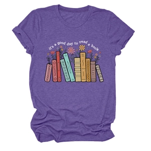 Detail of purple cotton T-shirt featuring colorful books and floral graphic print