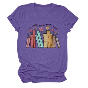 Detail of purple cotton T-shirt featuring 'it's a good day to read' text and floral art