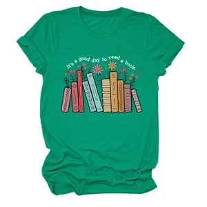 Detailed view of green cotton T-shirt featuring colorful books and floral graphic print