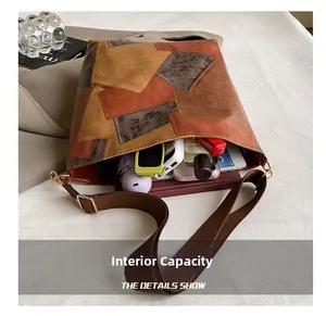 Detail view of large capacity interior for a colorblock tote bag with wide strap