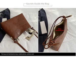 Detail view of large storage capacity for a brown patchwork leather shoulder bag