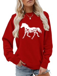 Close-up of red long sleeve sweatshirt with white horse silhouette and floral pattern
