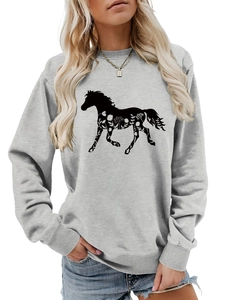 Detail of grey crewneck sweatshirt featuring a black horse silhouette with floral patterns
