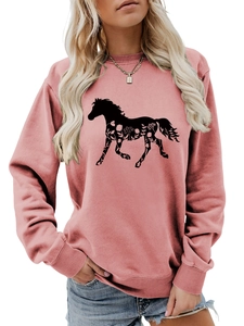 Close-up of pink long sleeve sweatshirt featuring a horse and floral graphic pattern