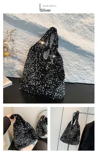 Detail showing the shiny silver sequins texture on the black oversized hobo tote bag