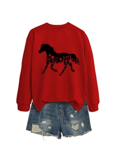Detail of red crewneck sweatshirt with horse floral print and distressed denim shorts