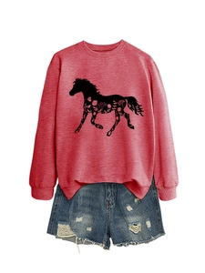 Detail of red long-sleeve sweatshirt featuring floral horse print and ripped denim shorts