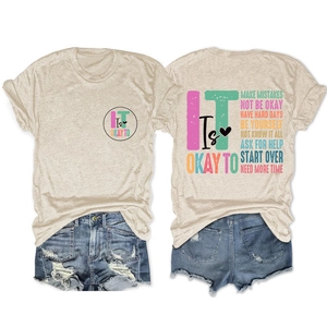 Detail of oatmeal t-shirt showing positive English slogans on front and back