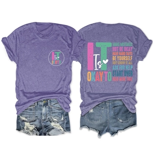 Detail view of purple crewneck T-shirt with back inspirational text and denim shorts
