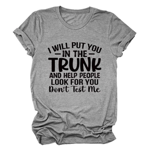 Detail of grey crewneck T-shirt featuring funny black slogan print on cotton fabric