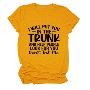 Detail of ginger yellow cotton T-shirt featuring black American humor slogan print