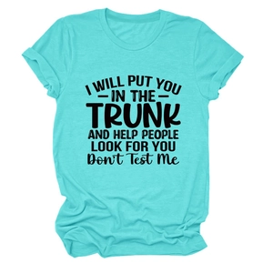 Detail of turquoise cotton t-shirt featuring bold black graphic slogan print and rolled sleeves