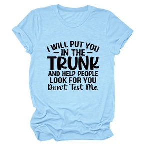 Detail of light blue cotton T-shirt featuring funny black slogan printed on the chest
