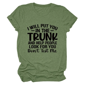 Detail of green t-shirt with I Will Put You In The Trunk slogan and rolled sleeves
