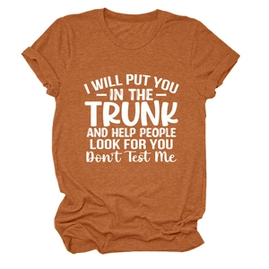 Detail of burnt orange t-shirt featuring i will put you in the trunk white typography print
