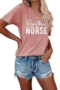 Detail of Registered Nurse graphic print on pink cotton t-shirt with denim shorts