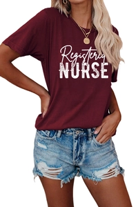 Detail of Registered Nurse graphic print on a maroon crew neck short sleeve T-shirt