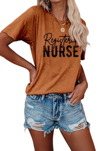 Burnt orange cotton t-shirt with Registered Nurse print paired with denim shorts
