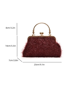 Dark red velvet evening clutch bag with golden vintage handle and kiss-lock closure