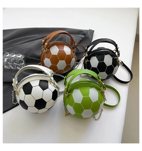 Detailed view of four soccer-shaped crossbody bags in assorted colors with gold chain straps