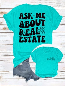 T-shirt bleu sarcelle à plat avec imprimé Ask Me About Real Estate détaillé au dos