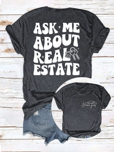 T-shirt gris à plat avec imprimé 'ASK ME ABOUT REAL ESTATE' et graphique de clé