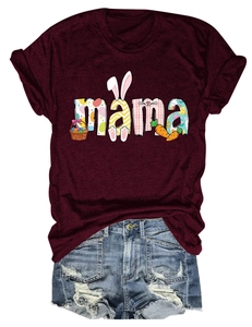Close-up of Mama Easter print with bunny ears and colorful eggs on burgundy t-shirt