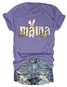 Flat lay of purple Easter MAMA T-shirt with bunny ears print and denim shorts
