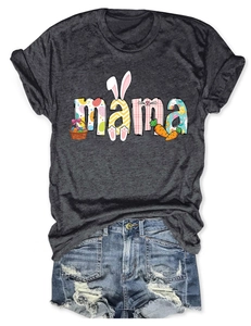 Detailed flat lay of a grey mama t-shirt with Easter bunny motifs and denim shorts