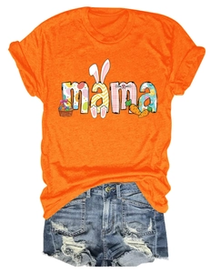 Close-up of MAMA typography with Easter egg and rabbit patterns on orange t-shirt