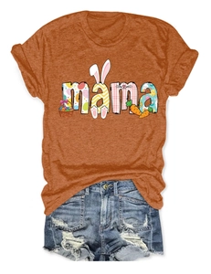 Close-up of Easter-themed MAMA t-shirt with bunny and egg prints and denim shorts