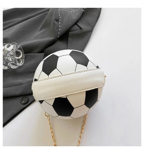 Detail showing soccer-shaped bag texture with premium black-white leather and gold chain