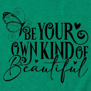Detail of the inspirational quote Be Your Own Kind Of Beautiful on green knit fabric