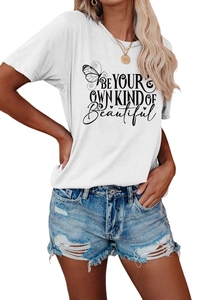 Detail of white cotton T-shirt featuring BE YOUR OWN KIND OF beautiful lettering and butterfly