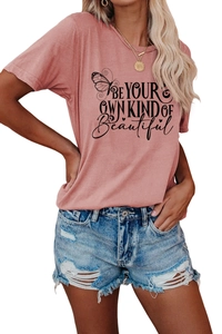 Pink crew neck t-shirt with butterfly print and Be Your Own Kind Of Beautiful slogan