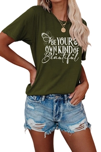 Detail of dark green t-shirt with butterfly print and inspirational quote text