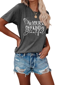 Detail of grey crewneck T-shirt featuring 'BE YOUR OWN KIND OF Beautiful' butterfly print