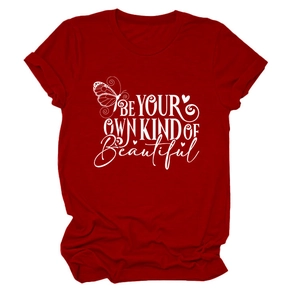 Detail of red crew neck cotton T-shirt featuring 'Be Your Own Kind Of Beautiful' print