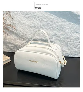 Close-up of white lychee pattern PU leather cosmetic bag with double zipper and top handle