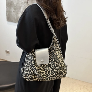 Chic leopard print tote bag with silver metallic flap and shoulder strap for women