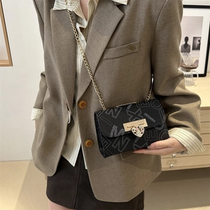 Chic black chain square crossbody bag with gold heart gem lock and pattern design