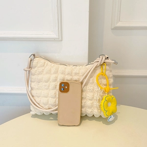 Capacity view of beige waffle fabric shoulder bag with phone and floral charm