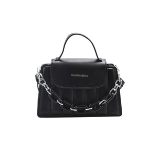 Retro black crossbody bag with vertical quilted pattern and decorative chunky chain link