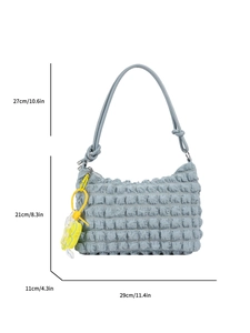 Light blue popcorn texture tote bag with dimensions 29x21x11cm and yellow pendant